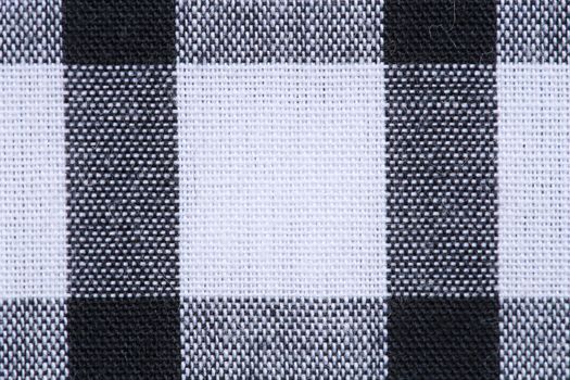 close up of gingham tablecloth fabric texture background
