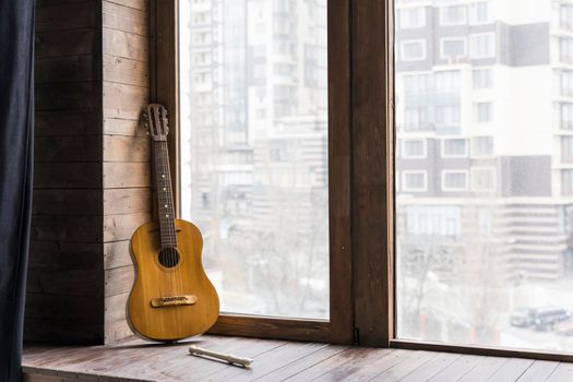 classical guitar modern city urban apartment