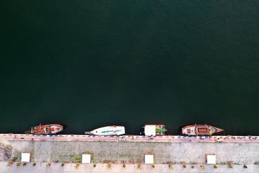 Aerial View by Drone of yachts or small boats.  Yacht and boats are moored at the quay. Parking