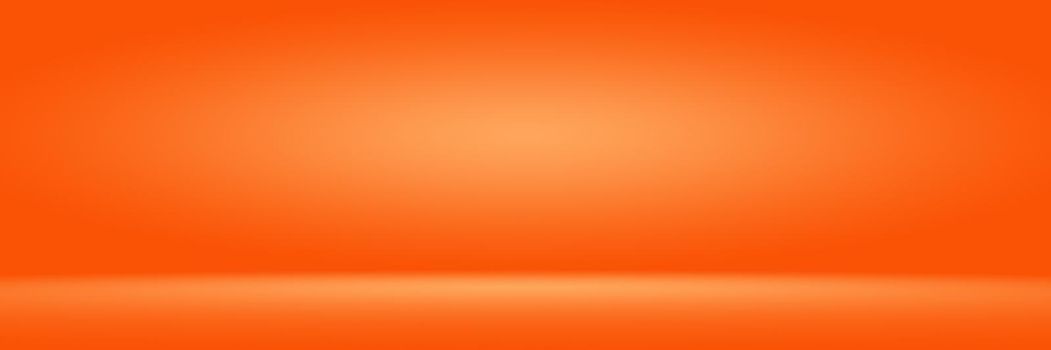 Orange photographic studio background vertical with soft vignette. Soft gradient background. Painted canvas studio backdrop.