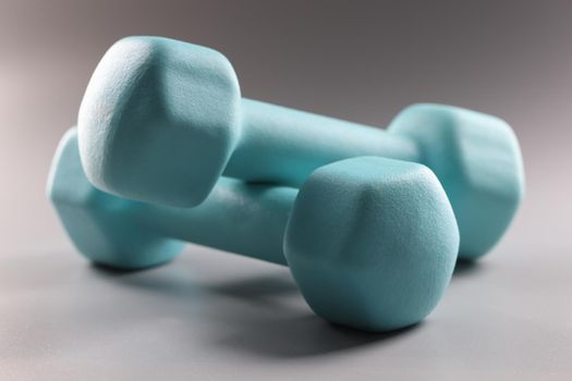 Heavy blue dumbbells for workout, plan weight loss, sport activity, get physical