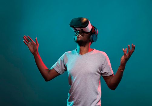 Millennial person using vr goggles to play online game