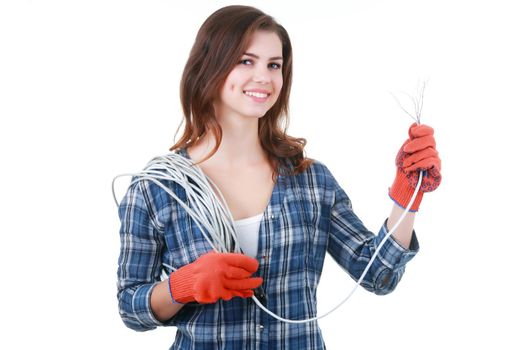 Builder woman holds an electric wire