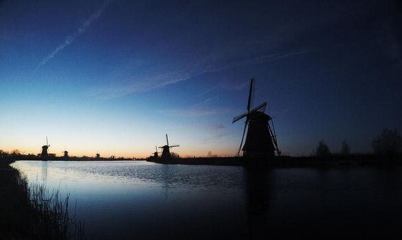 Dutch mill by night. Holland. Beauty world. Netherlands