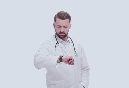 in full growth. medical doctor looking at his wrist watch
