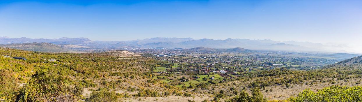 Podgorica, capital of Montenegro: panoramic aerial view. The city is renowned for its green parks. This small country is located on the Balkans peninsula on the Mediterranean, in South Eastern Europe