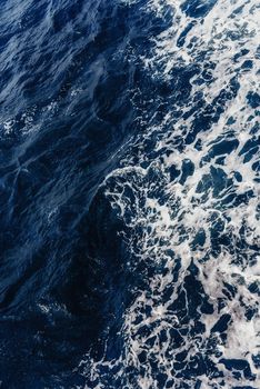 Textural background. Blue waves of the sea