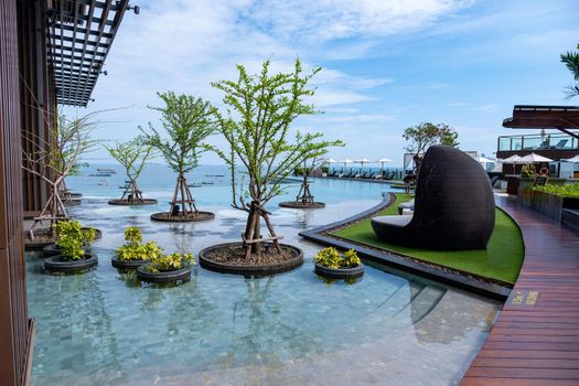 Pattaya Thailand, modern Hilton hotel at ocean front beach road Pattaya modern infinity pool