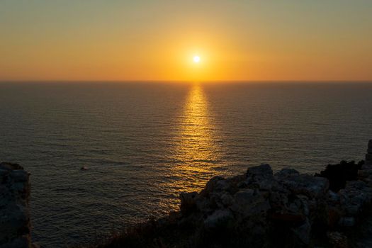 Beautiful sunset above the sea from Palaiokastro castle of ancient Pylos. Greece
