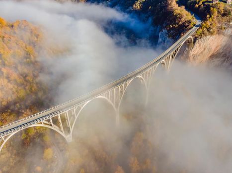 Montenegro. Dzhurdzhevich Bridge Over The River Tara foggy morning