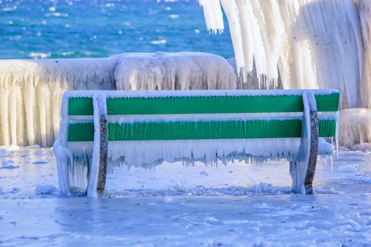 Frozen bench by very cold winter, Versoix, Switzerland