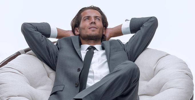 businessman resting in a comfortable chair