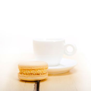 colorful macaroons with espresso coffee 