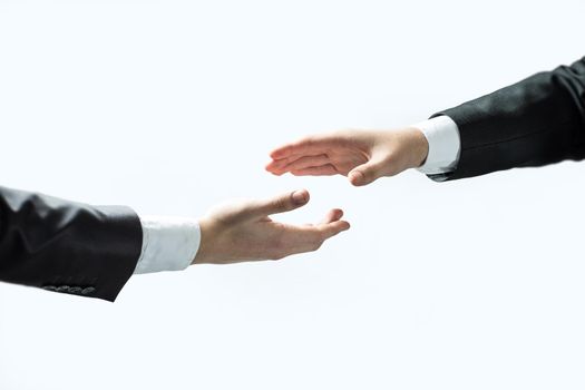 business people stretching out their hands for a handshake