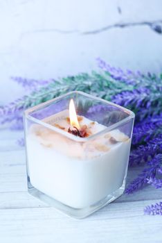 Burning scented candles for relax on table