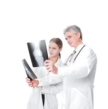 Woman doctor reviewing xrays with colleague.isolated on a white