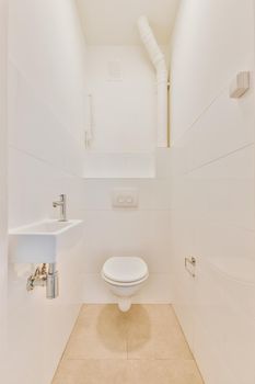 Simple toilet with small sink