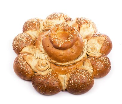 sweet roll, appetizing beautiful bun on a white background