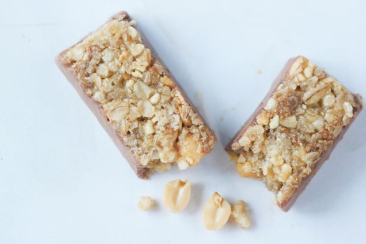 Almond and oat protein bars on table .