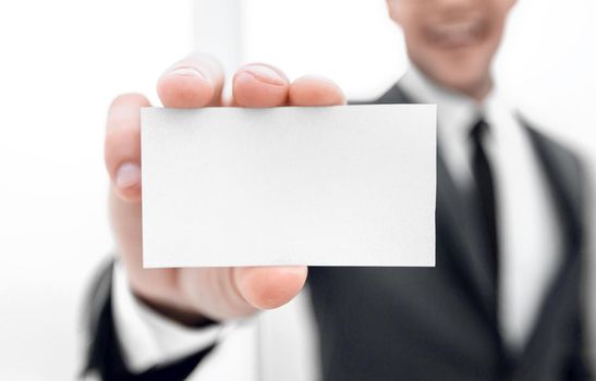 businessman showing a blank business card