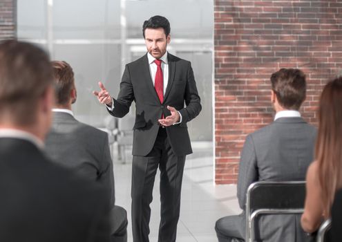 businessman holds a briefing for the business team