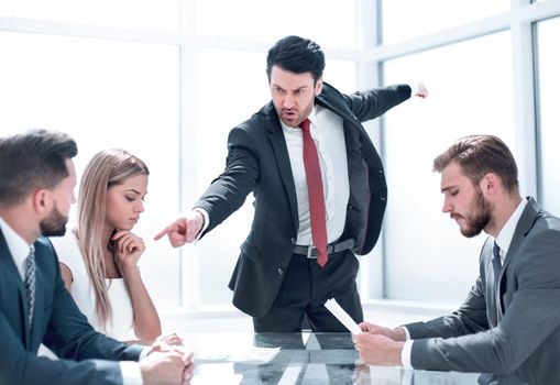 Strict boss telling upset female employee to leave meeting room