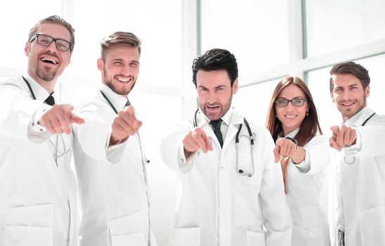 group of doctors pointing their finger at you
