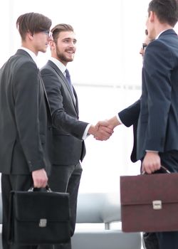 welcome handshake of business partners