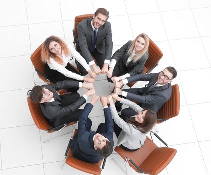 friendly business team sitting in a circl