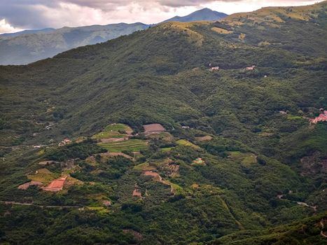 Italy, Liguria landscape with mountains trees and villages of the village of Vellego, travel reportage