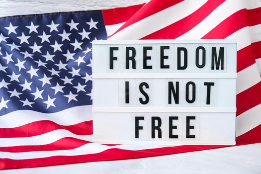 American flag. Lightbox with text FREEDOM IS NOT FREE Flag of the united states of America. July 4th Independence Day. USA patriotism national holiday. Usa proud.