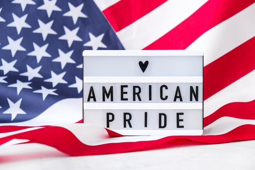 American flag. Lightbox with text AMERICAN PRIDE Flag of the united states of America. July 4th Independence Day. USA patriotism national holiday. Usa proud.