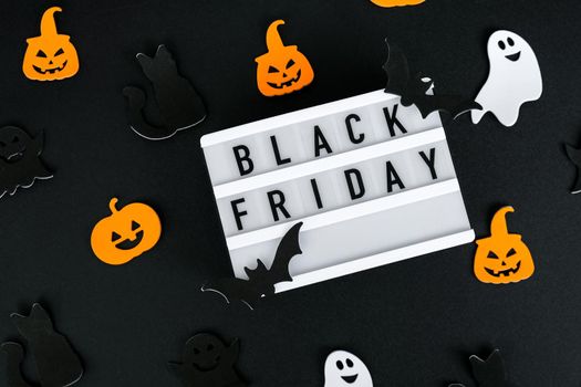 Lightbox with text BLACK FRIDAY, Halloween decorations Sale shopping concept. Template Black friday sale mockup fall thanksgiving promotion advertising. Holiday