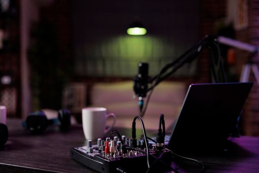 Empty desk with podcast equipment to record live talking show