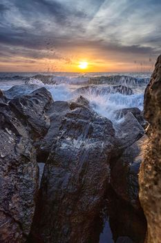 Amazing sea sunrise among the rocks at the Black Sea shore near Varna, Bulgaria