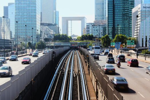 Paris, France - August 26, 2019: Day multi-lane road with skyscrapers of the La Defense