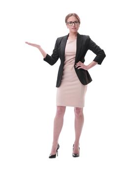 Businesswoman holding blank copy space on her open palm standing in full length