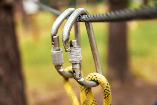 Carabiners weigh on safety rope