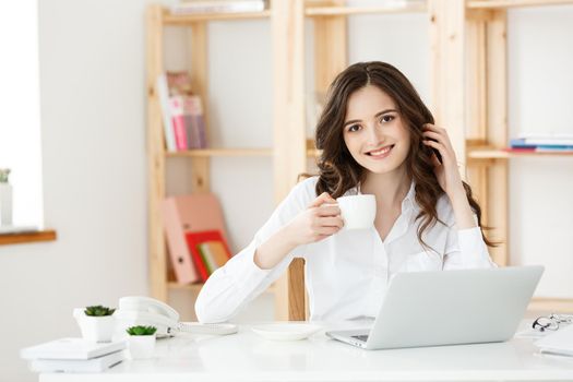 Woman Freelancer or business woman used Labtop working at modern office. Business and Technology concept