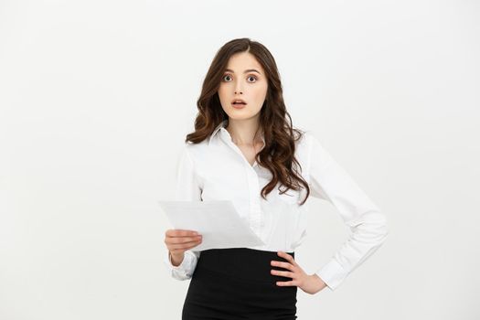 Worried businesswoman reading a notification isolated over white background.
