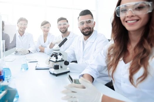 Group of young clinicians experimentation in research laboratory