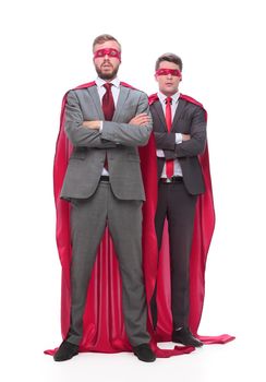 two business men superheroes standing together. isolated on white