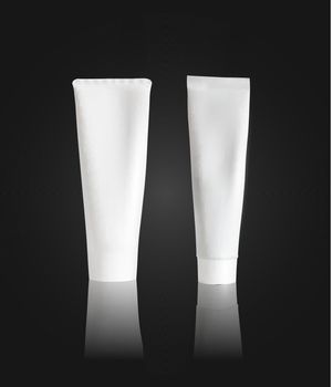 Cream tube mockup on black background. Tube packaging mock up. Vector illustration.