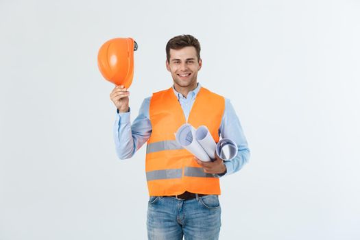 Portrait of confident young bussinessman architect or engineer smiling on white background.