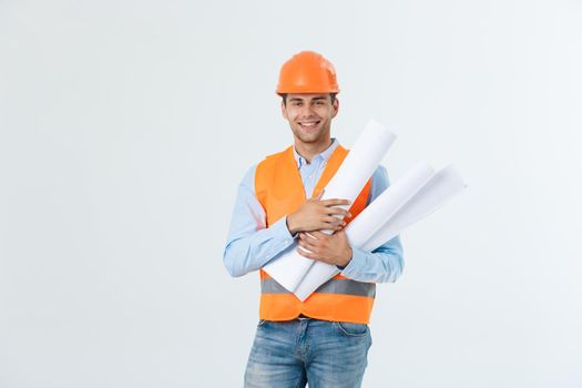 Male construction engineer with blueprint paper isolated on white.