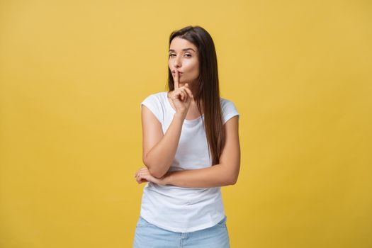 Close up portrait of cute lovely attractive uncertain unsure with stylish hairdo entrepreneur making hush gesture isolated on yellow background copy-space