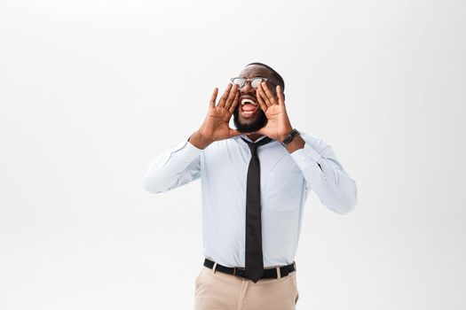 African man yelling with hand on his mouth isolated on a white background