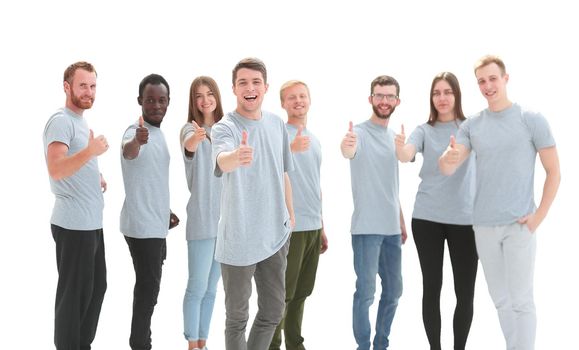 group of smiling young people showing thumbs up