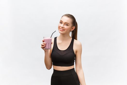 young happy woman with healthy diet shake drinking for sport and fitness.