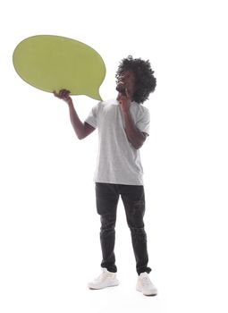 in full growth. curly-haired guy holding a speech bubble